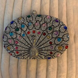 Sparkling Silver Peacock Clutch